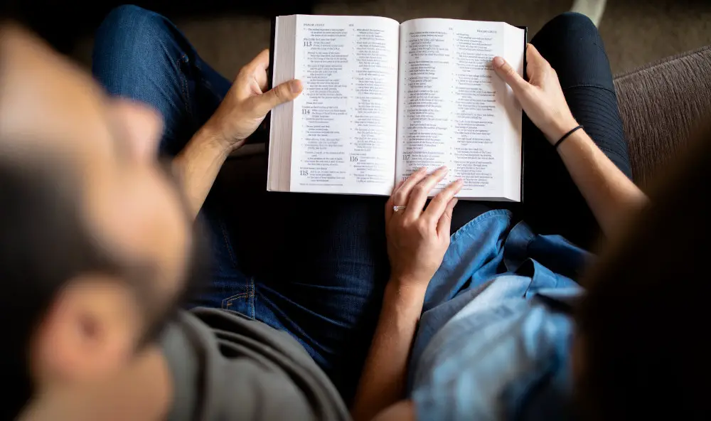 A Couple Reading The Bible Together