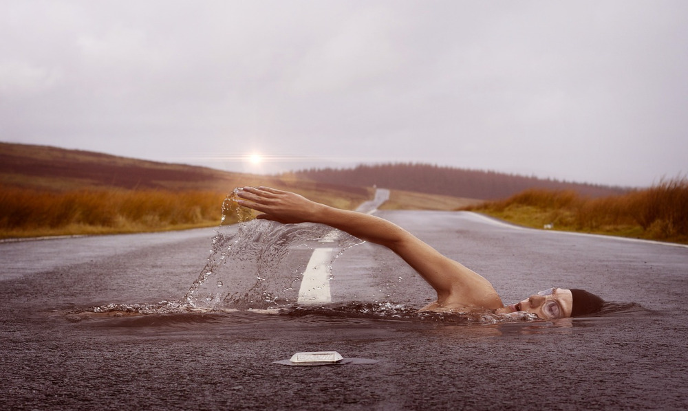 Man Swims Across Road In A Dream